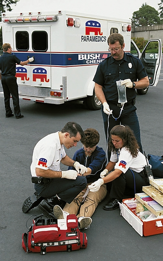Paramedics assist an injured Republican.